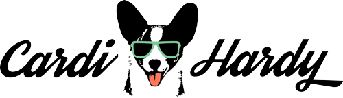Cardi Hardy logo - a black and white Cardigan corgi wearing sunglasses and sticking his tongue out